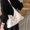 Bolso de axila retro de gran capacidad transfronterizo para mujer, nuevo bolso tote simple 2026, bolso versátil de hombro y cruzado para el día a día