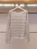 Shenzhen Nanyou Ropa Fina para Mujer Otoño Nueva Llegada Estilo Suave Moderno Versátil Top de Punto Calado de un Hombro Top para Mujer