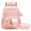 Nuevo juego de mochila escolar de tres piezas transfronteriza para estudiantes de primaria, mochila para niñas de gran capacidad con lazo, diseñada para reducir la carga, directo del fabricante