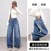 Jeans retro americanos de pierna ancha y corte curvo en negro y gris, de tiro alto, adelgazantes, alargadores, corte relajado, pantalones rectos hasta el suelo