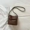 Bolsa de Mão Tipo Balde Trançada Shuai Mi Jia para Mulheres, Novo Modelo Verão 2026, Alto Valor Estético, Bolsa Simples Casual para Ombro para o Dia a Dia