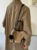 Bolso cubeta retro de nicho 2026 principios de otoño nuevo bolso de mano estampado de leopardo bolso de hombro mate bolso bandolera de gamuza para mujer