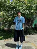 Camisa de Manga Curta Azul Estilo Férias Estampa Ilha Gola Cubana Estilo Preguiçoso Nicho Casual Verão para Homens e Mulheres