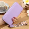 Bolsas Femininas 2025 Primavera Novo Estilo Couro PU Tendência Moda Simples Carteira Clutch Estampada Bolsas Atacado Tendência