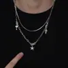 Colar de duas camadas com pingente de estrela, um acessório moderno e versátil para homens e mulheres, apresentando um design hip-hop único e tendência