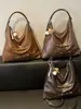 Bolsa de ombro única de cor sólida com nova textura transfronteiriça, bolsa de axila, mochila de grande capacidade moderna, bolsa tote alta e estilosa