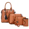 Bolsa Feminina 2025 Novo Estilo Costurada Simples Conjunto de Quatro Peças Bolsa Mãe e Filha Grande Capacidade Bolsa de Ombro Bolsa Transversal Fabricante Atacado