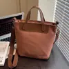Bolso de Hombro Versátil de Moda para Mujer, Bolso Cubo de Gran Capacidad para el Trabajo, Nuevo Bolso Transfronterizo para el Brazo 2025