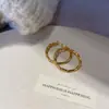 Novedad 2025 Pendientes de Moda con Baño de Oro Real de 18K con Acabado de Alta Gama, Pulidos a Espejo, Pendientes de Aro Grandes Únicos con Flor de Cáñamo
