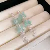 Brincos Assimétricos de Flor Pintada em Spray com Agulha de Prata Minimalistas Tendência de Verão Simples Brinco de Tarraxa Brincos de Moda com Temperamento para Mulheres