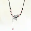Nuevo Collar de Mariposa de Cerámica China para Mujer Nicho de Arte Cadena de Lana Suministro para Puestos Ambulantes Venta al por Mayor Cadena para Clavícula de Temperamento
