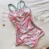 Princesa Sirena DeslumbranteEstampado retro francés adelgazante sin espalda que realza la figura traje de baño deportivo de una pieza estilo resort para mujer en verano