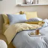 Juego de ropa de cama de algodón 100% de grado A para maternidad e infantil, juego de cuatro piezas de algodón puro con un diseño de dos tonos simple y de alta gama, que incluye funda de edredón, sábana plana y sábana bajera