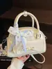Bolsa Boston Portátil Moda Nicho Nova Primavera Verão Estilo Doce Coreano Casual Versátil High-End Transversal Bolsa Feminina