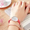 Reloj Sk Shengke Estudiante Simple Casual Moda Tendencia Cuarzo Correa de Fibra de Agua Dos Pines Semicircular Aleación