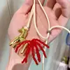 Collar Colgante de Caballo de Vidrio con Cordón de Cera Moda Personalidad Nicho Cadena para Clavícula Simple Versátil Joyería de Gama Alta Venta al por Mayor