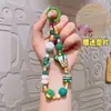 Celebridad de Internet Ins Pulsera de Pulsera de Cuentas de Dibujos Animados Japoneses y Coreanos Linda Cadena de Teléfono Móvil de Té con Leche Llavero Regalo Venta al por Mayor