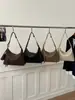 Bolsas Retro Melanoides para Mujer 2026 Nuevo Pequeño Nicho Gran Capacidad Bolso de Mano para Viajes Diarios Bolso Cruzado de Hombro Único Simple