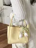 Bolsa estilosa de alta capacidade para mulheres, novo modelo de verão 2026, bolsa de ombro e transversal texturizada para o dia a dia, bolsa tipo balde da moda