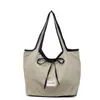 Moda 2025 Nuevo Versátil Estilo Coreano Simple Retro Versátil Elegante Lazo Un Solo Hombro Cruzado Bolso Pequeño