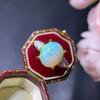 Venta al por mayor de fábrica explosiones anillo de ópalo natural plata S925 con incrustaciones piedra principal 10x 12 caliente Europa y Estados Unidos una generación de cabello