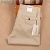 Serie B serie BA primavera y verano delgado suave sin planchar antiarrugas Tencel algodón algodón peinado bolsa de solapa hacia atrás pantalones casuales de negocios para hombre