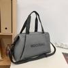 Bolso de viaje portátil de corta distancia para hombre, bolso bandolera de viaje de gran capacidad, bolso deportivo de moda sencillo y elegante.