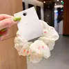 Goma para el pelo con flores de margarita Estilo coreano Scrunchie Banda para coleta de chica Goma para el pelo a cuadros