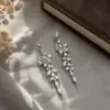 Brincos Elegantes com Franjas e Zircônia para Mulheres com Rosto Quadrado ou Redondo, Apresentando Efeito Emagrecedor, Design de Luxo Leve de Nicho, Brincos de Tarraxa Versáteis e Estilosos