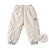 Pantalones cálidos acolchados para bebé otoño e invierno ropa exterior clase A para niños y niñas bebé 120g engrosados a prueba de viento con puños pantalones de chándal pantalones largos