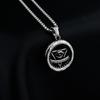 Collar de pareja moderno y popular con colgante de neumático Ojo del Diablo, accesorios versátiles de hip hop de acero de titanio personalizados para hombres y mujeres