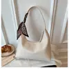 Bolso tipo dumpling retro de estilo francés para debajo del brazo para mujer, nuevo bolso de mano y bandolera versátil casual de moda 2025