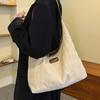 Bolsa de ombro casual bolsa de axila da moda 2025 nova primavera bolsa de ombro de nicho simples bolsa da moda para mulheres
