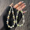 Nuevo colgante de cadena de cristal para teléfono con cuentas de lirio del valle, accesorio para bolso, correa de muñeca, llavero antipérdida, cordón para teléfono