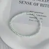 Pulseira Minimalista Exquisita com Estilo Fresco Pequeno, Pulseira de Contas de Arroz, Versátil e Fashion, Design Único, Venda Direta da Fábrica