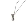 Collar Largo con Colgante de Bolso Tejido Vintage para Mujer 2025 Nuevo de Alta Gama Lujo Ligero Nicho Temperamento Accesorio para el Cuello