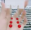 Pendientes de Linterna Estilo Chino y Petardos 2026 Nuevos Pendientes Rojos Festivos de Año Nuevo con Sentido de Diseño, Pendientes Largos para Mujer