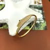 [Chapado en Cobre con Oro Real] Pulsera Cruzada de Gypsophila Transfronteriza, Lujo Accesible Personalizado Pulsera de Moda de Trébol de Cuatro Hojas Completamente Diamantada 18K