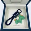 Fique Rico Imediatamente Pingente de Chaveiro de Couro de Vaca Feito à Mão para Carro Lanyard Elegante Simples Exquisito para Casais Masculinos e Femininos