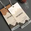 Etiquetas colgantes de alta gama de algodón y lino, etiquetas colgantes plegables hechas a medida, diseño de logotipo, impresión de etiquetas para ropa y etiquetas colgantes de certificado