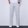 Calças casuais curtas masculinas 2026 nova coleção outono slim fit elásticas calças 9/10 para homens