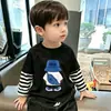 Camiseta de manga larga para niño, nuevo modelo otoño 2026, playera básica de algodón puro para niños, top estiloso para niños, dos piezas para primavera y otoño