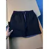 Shorts de secado rápido estilo patchwork americano para hombre, con diseño de bloques de color, un look elegante y deportivo, y corte recto, perfectos para el verano y la playa.