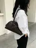 Bolso bowling lujoso y sofisticado, bolso de mano simple tipo Boston, nuevo modelo 2026 bolso de cuero genuino para mujer, bolso de hombro y para llevar debajo del brazo