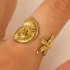 Anillo de Acero Inoxidable con Perla de Zirconia Estilo Oceánico Transfronterizo Europeo y Americano Anillo de Estrella de Mar Concha Caracola Joyería de Mano Elegante para Mujeres