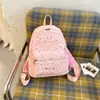 Mochila com estampa de estrelas, grande capacidade, simples e versátil, adequada para estudantes, estilo coreano, com estampas de letras e um visual preppy de faculdade.