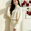 Diseño estilo coreano, nuevo estilo suave, suéter de punto niche para interior con cuello semi-alto y mangas murciélago, jersey negro para mujer