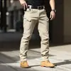 Pantalones casuales retro de camuflaje táctico impermeables de concha blanda sueltos para hombre de primavera/otoño, europeos y americanos, para exteriores