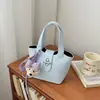 Bolso de Mano Simple Estilo Coreano con Patrón de Lichi para Mujer 2026 Nueva Moda de Gama Alta Versátil Bolso Cruzado Cubo