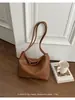 Bolso tejido transfronterizo súper popular para mujer, nuevo bolso tote de nicho de alta gama para madre e hija, versátil para ir al trabajo, bandolera y de hombro